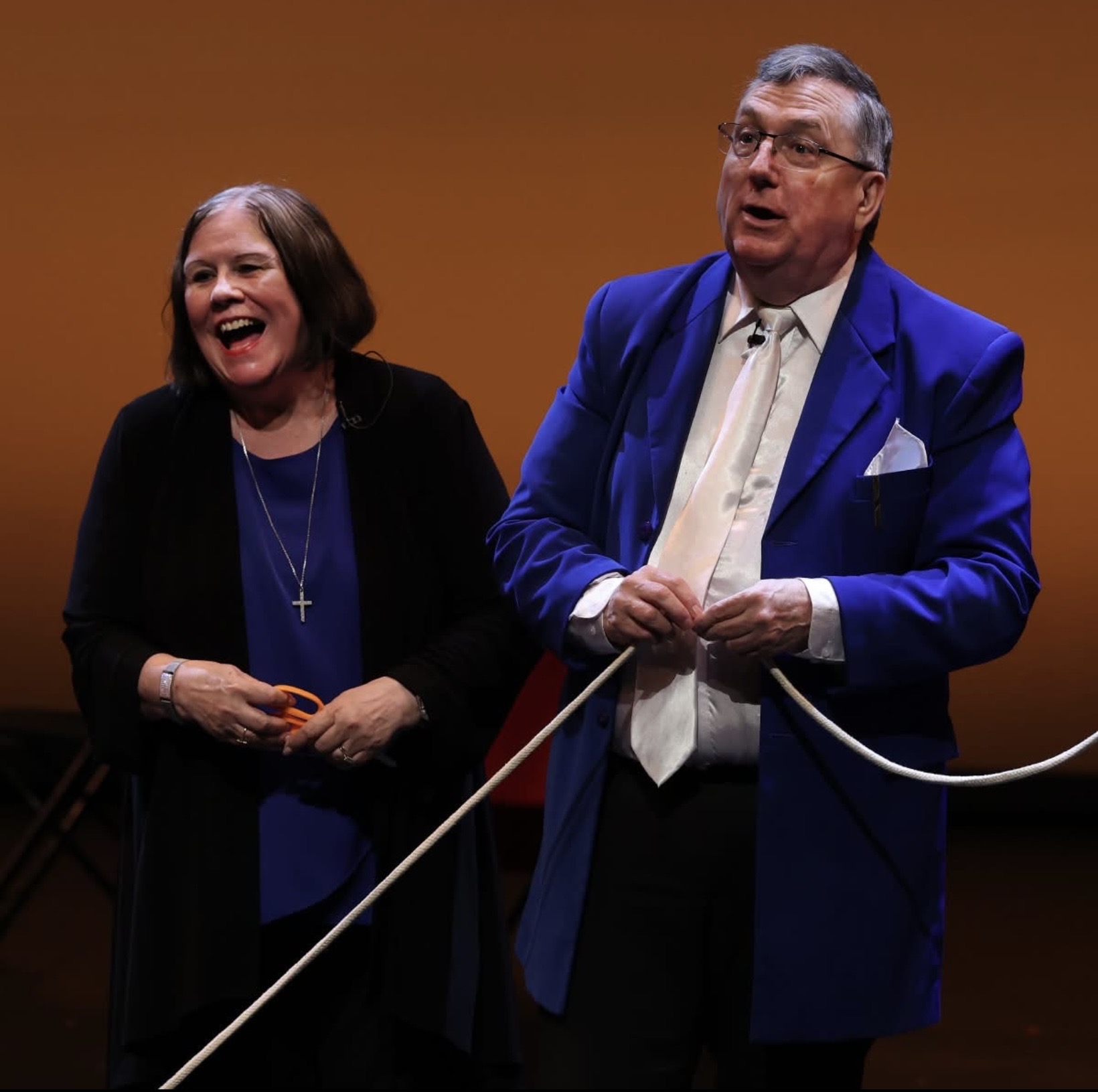 Greg Wood and Oonaugh performing comedy magic